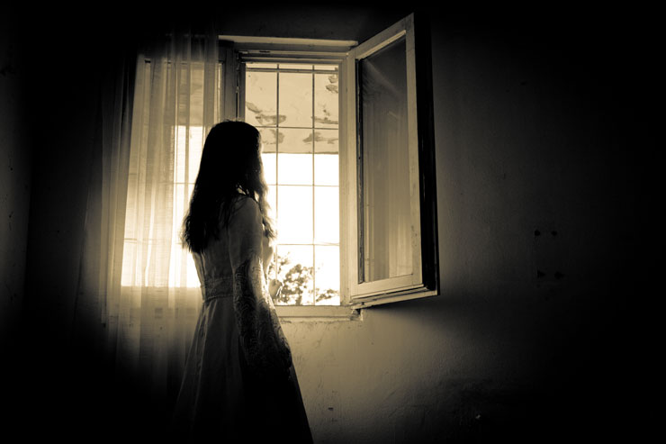 Haunted Houses Scary woman in a Haunted House