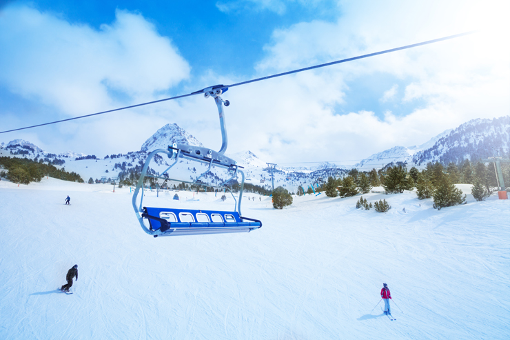Ski lift seat over the pistes in mountains in Grandvalira Andorra